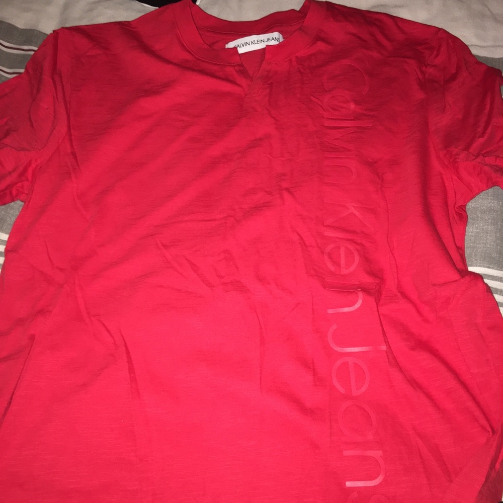 Men’s red Calvin Klein shirt